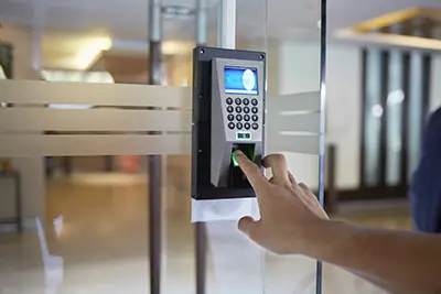 Access control system by digicode and/or fingerprint